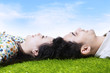 Photo: Happy couple with heads together on field Happy couple with heads together on field