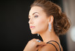 woman with diamond earrings