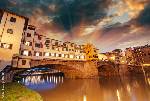 Photo: Florence, Italy. Wonderful sunset above Magnificent Ponte Vecchi Florence, Italy. Wonderful sunset above Magnificent Ponte Vecchi