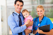 pediatric doctor and nurse with baby