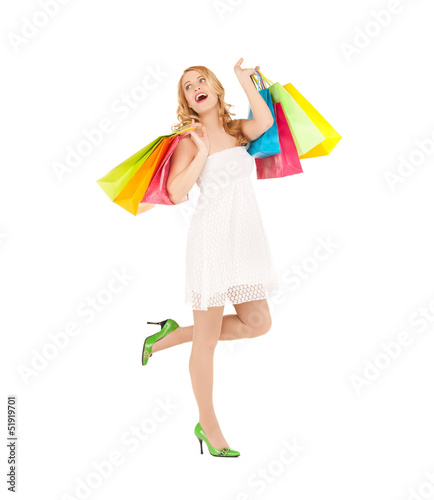 Photo: woman with shopping bags woman with shopping bags