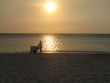 Photo: Silhouette of Ice Cream Cart and Vendor on Beach, Honduras Silhouette of Ice Cream Cart and Vendor on Beach, Honduras