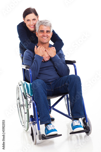 Photo: supportive middle aged wife and disabled husband supportive middle aged wife and disabled husband
