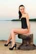 Brunette in black corset