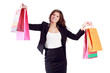 Happy young woman shows bags with purchases isolated on white
