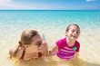 Photo: Family Playing in the beautiful Ocean Family Playing in the beautiful Ocean