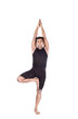 Photo: Yoga tree pose on white Yoga tree pose on white