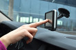 Photo: Driver entering an address into the navigation system Driver entering an address into the navigation system
