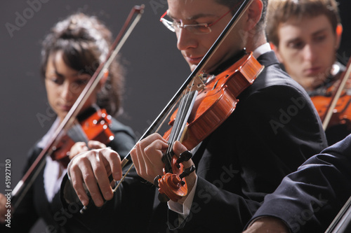 Photo: Classical music. Violinists in concert Classical music. Violinists in concert