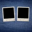Vintage photo frames on blue jeans background