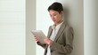 Asian Business woman using tablet