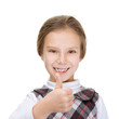 cheerful girl lifts thumb upwards