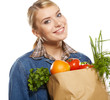 Photo: Young woman with a grocery shopping bag. Isolated on white backg Young woman with a grocery shopping bag. Isolated on white backg
