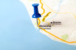 Photo: Thumbtack in the world map Thumbtack in the world map