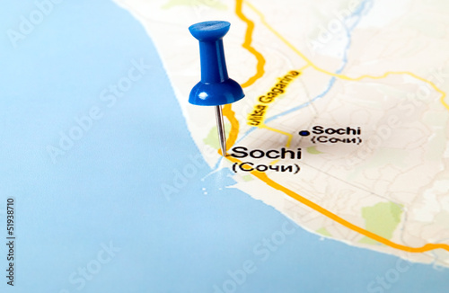 Photo: Thumbtack in the world map Thumbtack in the world map