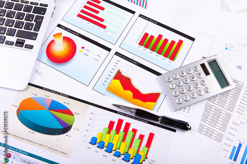 Photo: Financial papers on the table Financial papers on the table