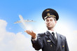 Image of pilot with plane in hand