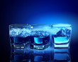 Three glasses of blue liquid