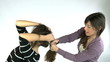 Woman pulling long hair to friend angry