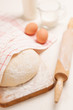 Dough on wooden board
