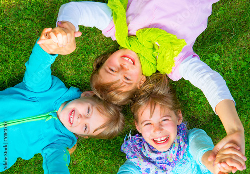 Photo: kids lying on the ground kids lying on the ground