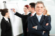 Business Team with leader in office