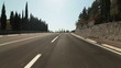 Driving car on mountain road along the coast