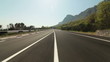 Driving car on coastal mountain road