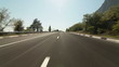 Driving car on coastal mountain road
