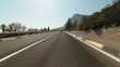 Driving car on coastal mountain road