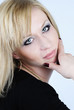 beautiful young blond woman with professional makeup