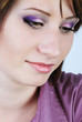 Photo: young emotional girl in a purple shirt with a short haircut young emotional girl in a purple shirt with a short haircut