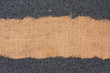 Poppy lying on sackcloth