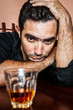 Drunk and depressed hispanic man
