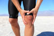 Foto: Injuries - sports running knee injury on man Injuries - sports running knee injury on man
