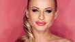 Close Up Portrait of Blond Sexy Woman on Pink Background