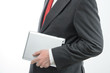 Businessman carrying digital tablet