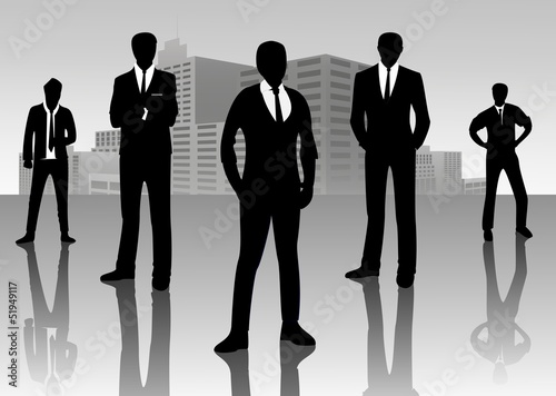 Vector: Businessman standing on cityscape Businessman standing on cityscape