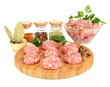 Raw meatballs with spices isolated on white