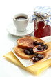 Photo : White bread toast with jam and cup of coffee, isolated on white White bread toast with jam and cup of coffee, isolated on white