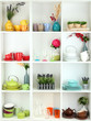 Beautiful white shelves with tableware and decor.
