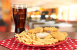 Fried chicken nuggets with french fries,cola and sauce