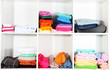Clothes neatly folded on shelves