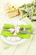 Table setting in white and green tones