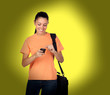 Photo: Pretty brunette girl with a mobile Pretty brunette girl with a mobile