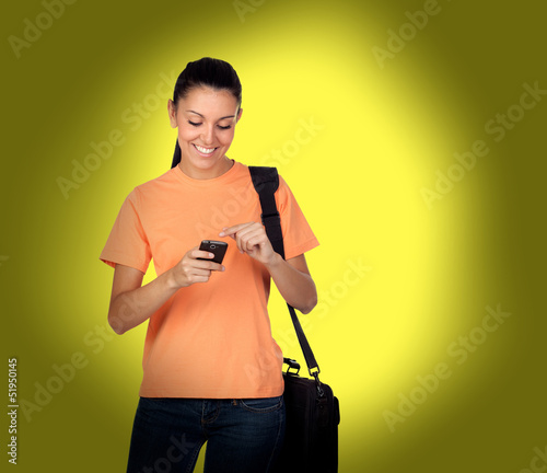 Photo: Pretty brunette girl with a mobile Pretty brunette girl with a mobile