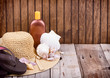 sun hat and sun lotion
