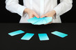 Hand with business cards. Concept: Business like poker game.