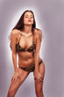 Hot glamour girl in leopard design 2-piece
