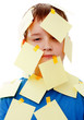 boy with memo posts on his face